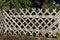 Wooden wattle fence in a garden