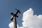 Wooden Weathervane Airplane and Summer Sky and Clouds