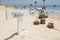 Wooden wedding sign on tropical sandy beach