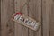 Wooden welcome sign with ribbon