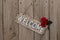 Wooden welcome sign with roses