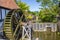 Wooden wheel of a historic water mill in the old town of Aarhus