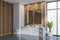 Wooden and white bathroom interior with sinks and mirror near panoramic window