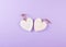 Wooden white hearts, rustic style, purple background, valentine`s day decor. Top view background.