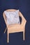 Wooden wicker chair with cushion