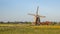 Wooden windmill on countryside