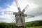 Wooden windmill in the forest