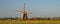 Wooden windmill with miller house