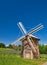 Wooden windmill under clear sky