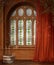 Wooden window with curtains