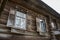 Wooden windows with shutters. House of Serov. Kostroma region.