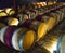 Wooden wine barrels in a basement