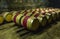 Wooden wine barrels in a basement