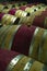 Wooden wine barrels in a basement