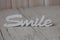 Wooden word smile