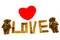 Wooden words `LOVE` made from natural material letters .Valentine background