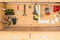 Wooden workbench at workshop. Lot of different tools for diy and repair works. Wood desk for product display. Copyspace. Labour da