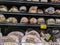 Woodinville, WA USA - circa April 2022: Straight on view of a variety of cooked and uncooked hams for sale inside a Haggen