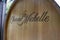 Woodinville, WA USA - circa August 2021: View of the Chateau St. Michelle logo on a wooden barrel outside of the tasting room