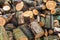 Woodpile of chopped lumber. Pile of wood logs. Stacked firewood timber