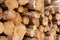 Woodpile of cut trees in the lumberyard