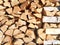 Woodpile of firewood in the open. WoÐ¾dpile background image