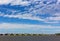 Woodrow Wilson Bridge under the blue sky with scenic clouds.