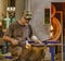 Woodstock, Vermont - October 13, 2018 - Craftsman creates glass bottle in workshop.