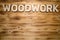 WOODWORK word made with building blocks on wooden board