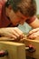 Woodworker Making Close Measurement