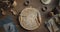 Woodworker`s workplace: workbench, carving tools, sandpaper and wood shavings