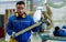 Woodworking carpenter furniture hand cutting. Man factory industry manufacturer. worker in a carpenter`s workshop using saw machin