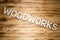 Woodworks word made of wooden block letters on wooden board