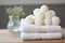 wool dryer balls on a fresh towel stack