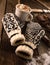 Wool mittens with hot chocolate in a rustic setting