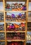 Wool yarn threads, colored yarn skeins arranged on shelves, knitting as a hobby