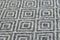 Woolen fabric texture close-up. Gray contrast diamond pattern