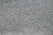 Woolen fabric texture close-up. Gray contrast diamond pattern