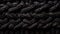 Woolen Wicker: A Macro View of Intricate Textile Details in Black