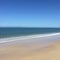 Woorim Beach, clear sky, clear water, clear sand.