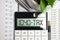 Word 1040 Tax on calculator. Business and tax concept