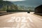 The word 2021 written on highway asphalt road. Concept for new year 2021 or planning and challenge or career path. Future journey