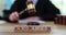 Word Abortion from wooden blocks on background of judge
