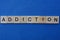 Word addiction made from  wooden letters