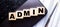 The word ADMIN is written on wooden cubes near the handle