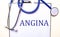 The word ANGINA is written on a white sheet near the stethoscope. Medical concept