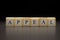 The word APPEAL written on wooden cubes isolated on a black background