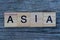 Word asia made from wooden gray letters