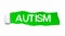 The word AUTISM appearing behind green torn paper