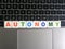 Word Autonomy on keyboard background
